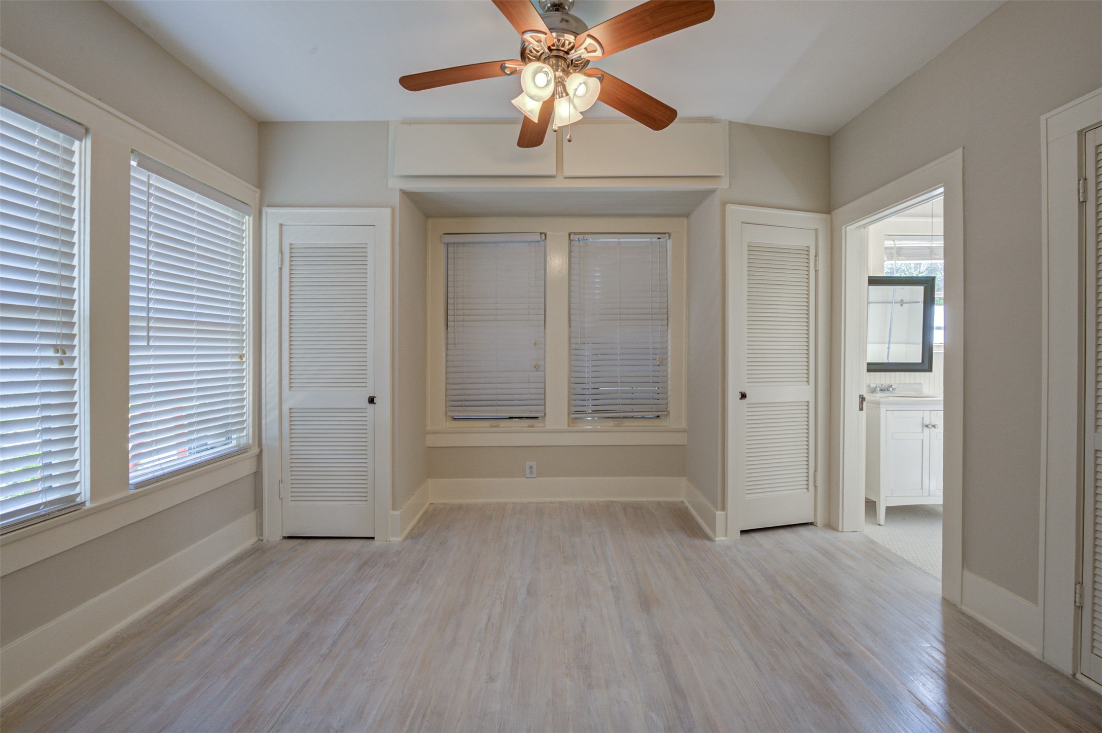 1001 Bomar Street, Unit B Houston, TX 77006 - Photo 11 of 19 wooden floor in an empty room with a window