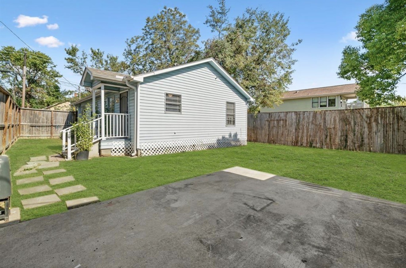 402 Paschall Street Houston, TX 77009 - Photo 11 of 11 a view of a house with a yard and large tree