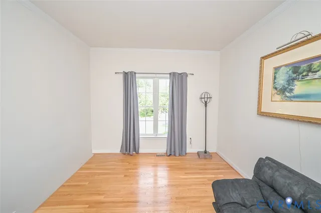 a view of livingroom with washer and dryer