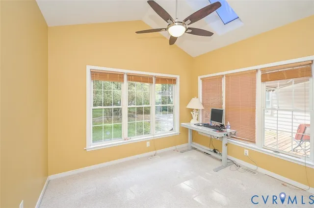 a view of a bathroom with a tub and shower