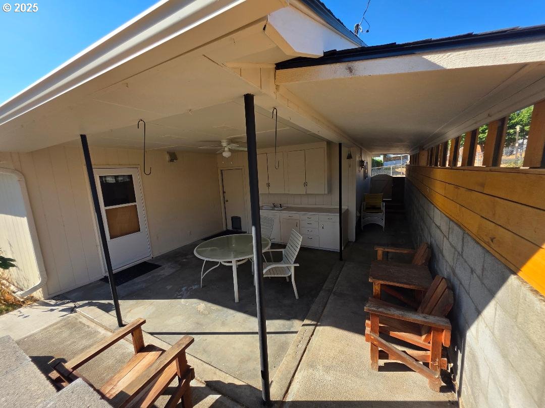 614 Staats Avenue Maupin, OR 97037 - Photo 33 of 39 a room with furniture and wooden floor