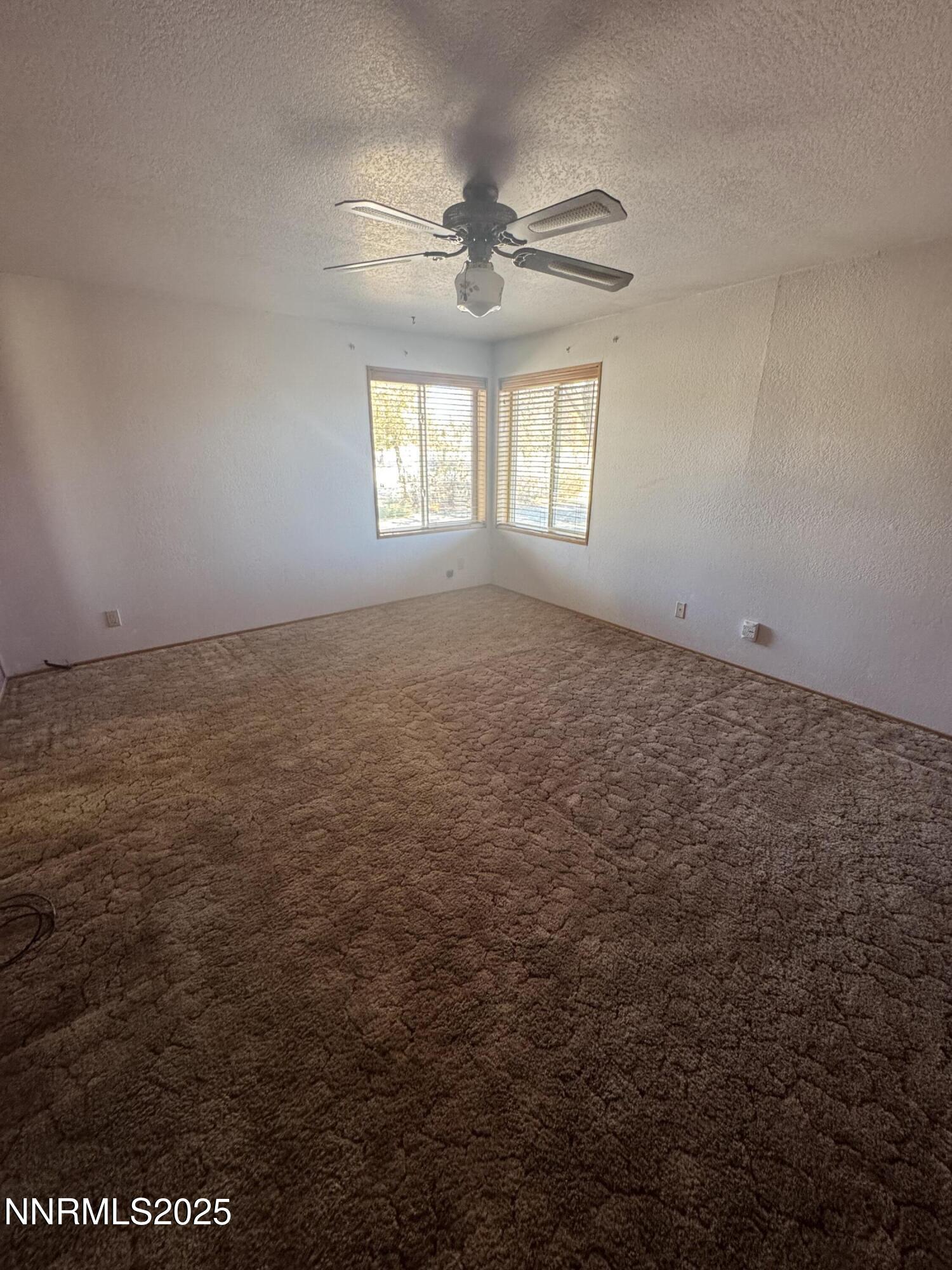 3255 Upper Valley Road Lovelock, NV 89419 - Photo 16 of 28 an empty room with a window