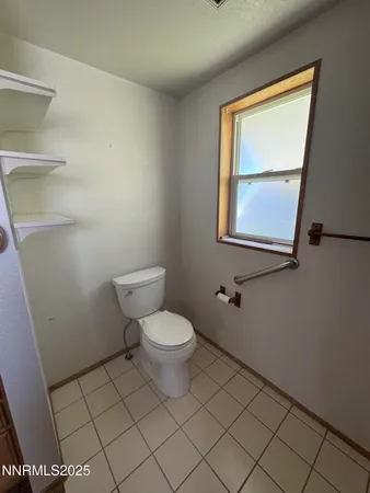 a hallway with a washer and dryer