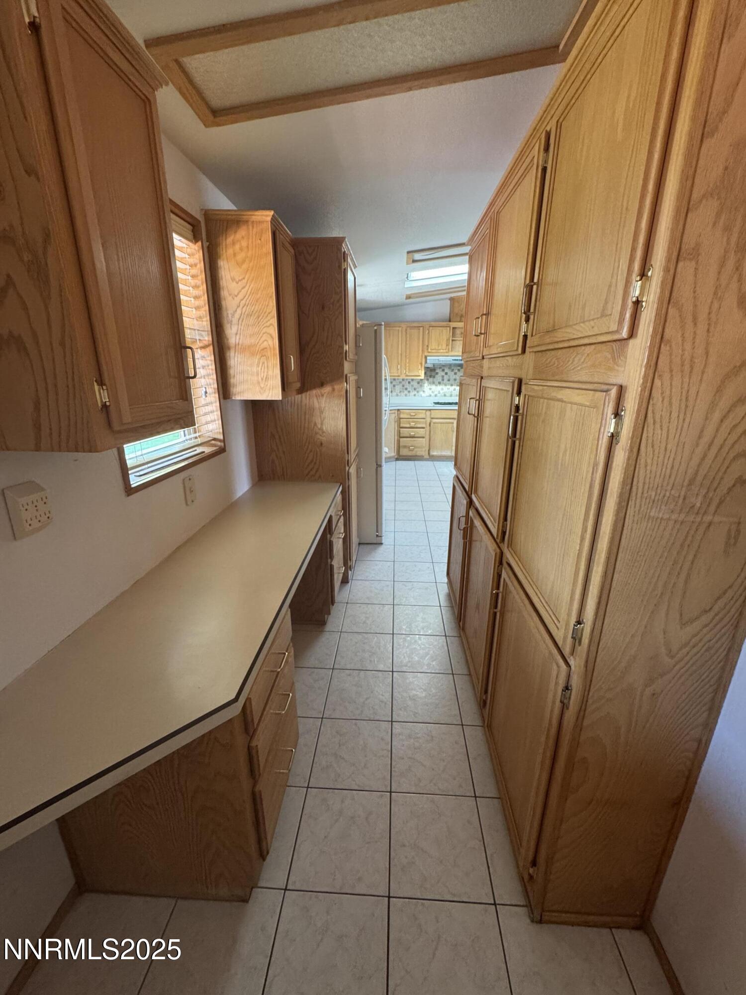 3255 Upper Valley Road Lovelock, NV 89419 - Photo 23 of 28 a hallway with a washer and dryer