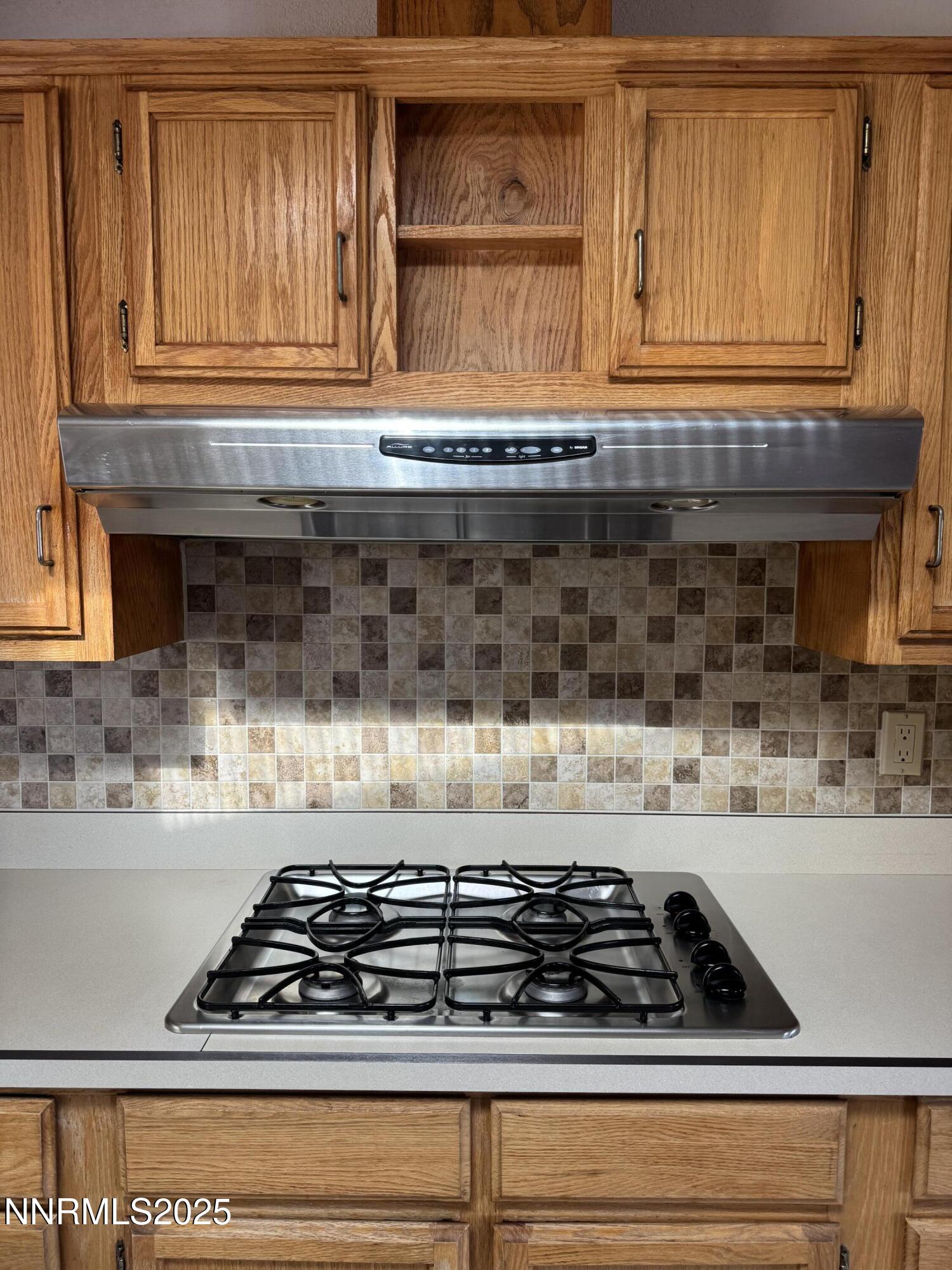 3255 Upper Valley Road Lovelock, NV 89419 - Photo 9 of 28 a kitchen with stove and cabinets