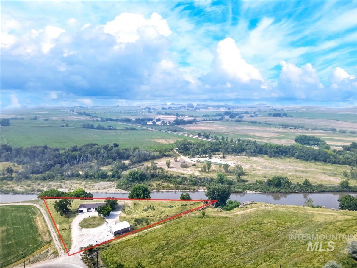 8989 Hillview Road Emmett, ID 83617 - Photo 46 of 50 Expansive property featuring a single-story dwelling, a detached outbuilding, and direct river frontage