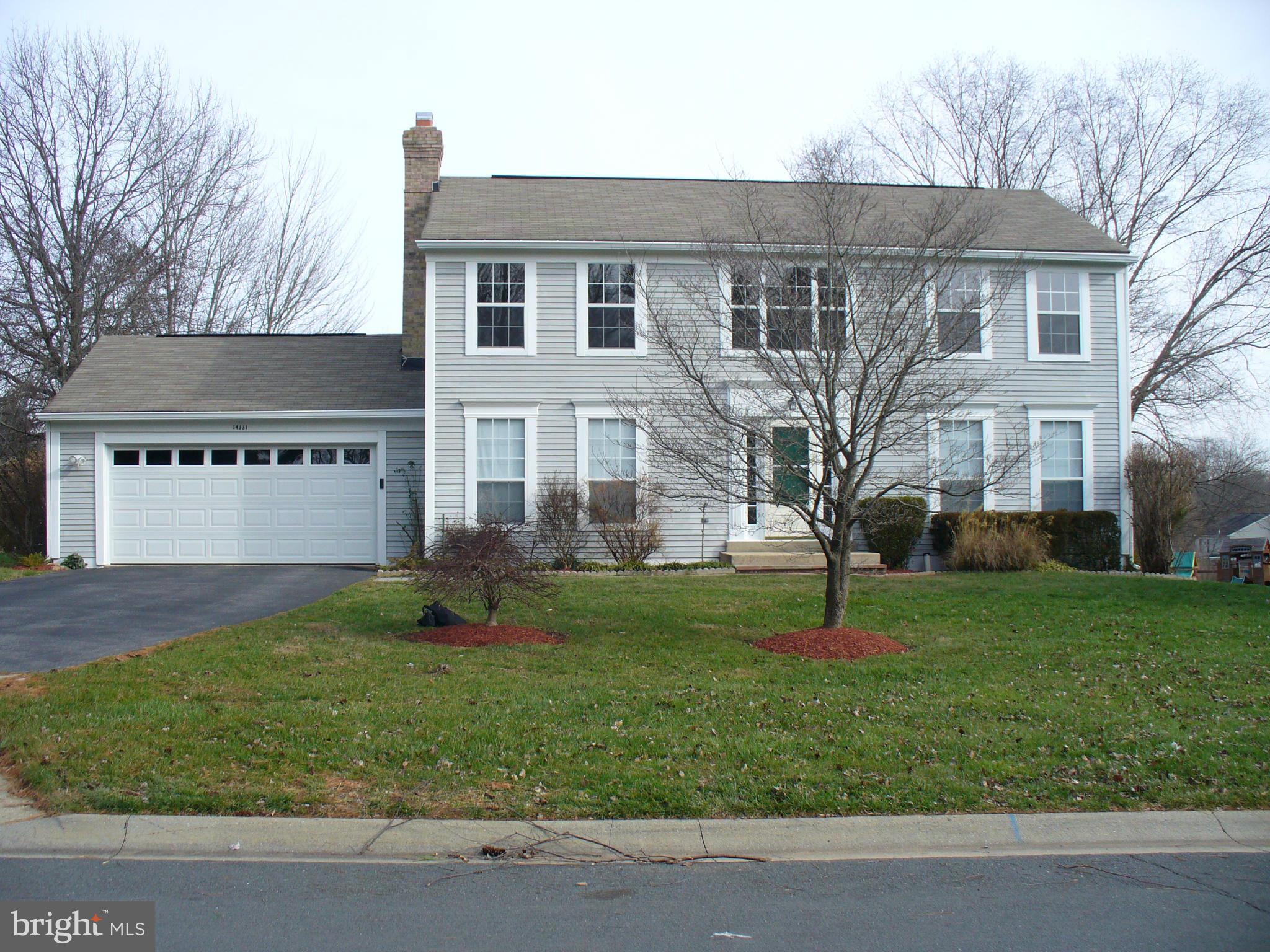 14331 Twig Road Silver Spring, MD 20905 - Photo 1 of 27 a view of a house with a yard