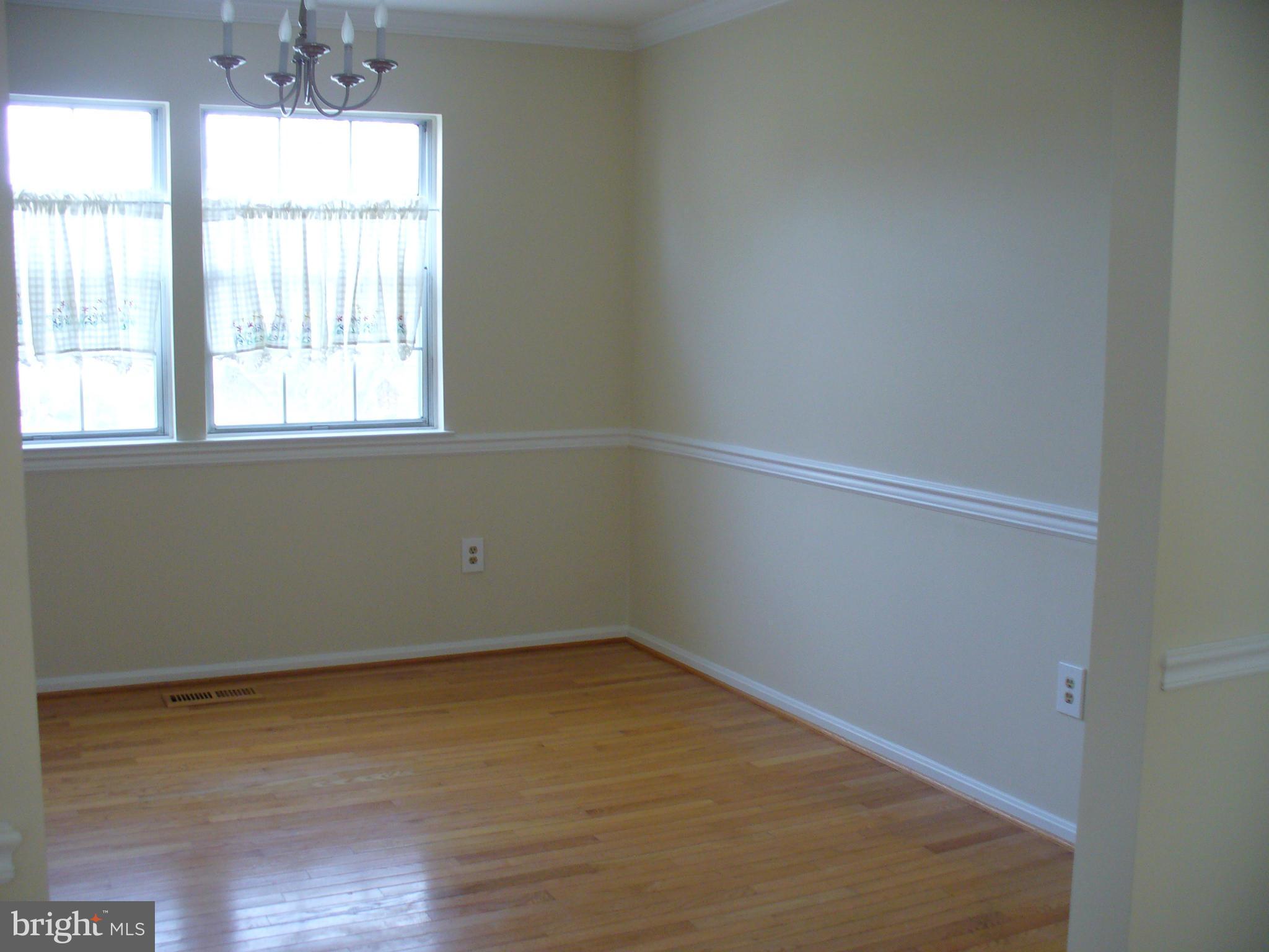14331 Twig Road Silver Spring, MD 20905 - Photo 13 of 27 an empty room with a window