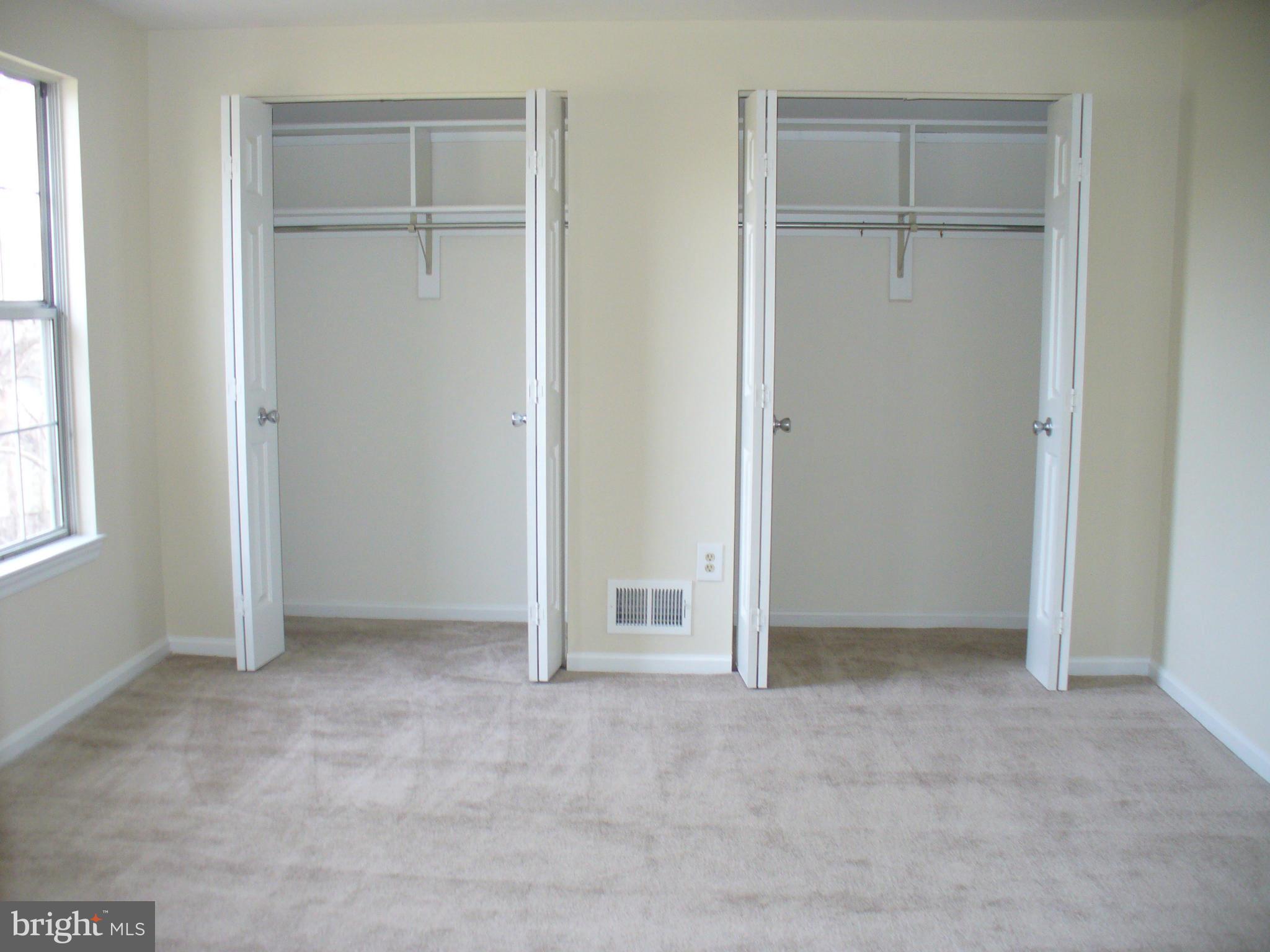 14331 Twig Road Silver Spring, MD 20905 - Photo 19 of 27 a view of an empty room with a closet