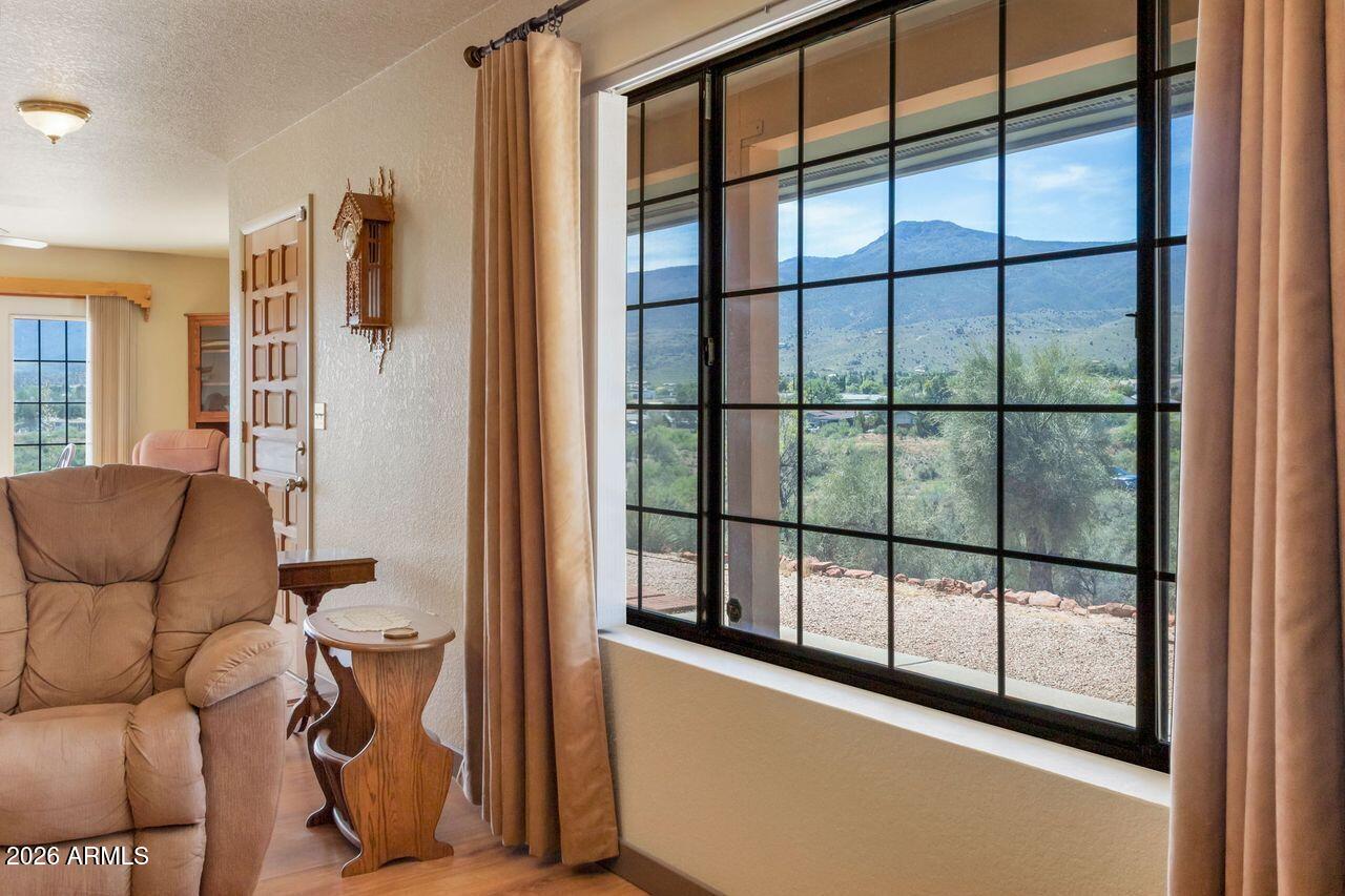 949 Rabbit Run Clarkdale, AZ 86324 - Photo 12 of 46 a view of a livingroom with furniture and windows