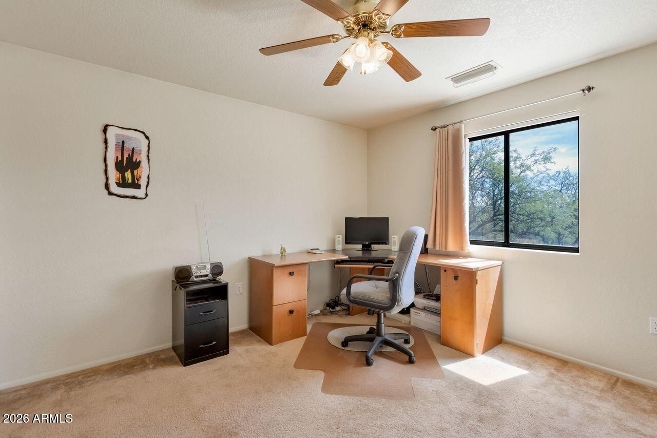 949 Rabbit Run Clarkdale, AZ 86324 - Photo 19 of 46 a view of a workspace with furniture and a window