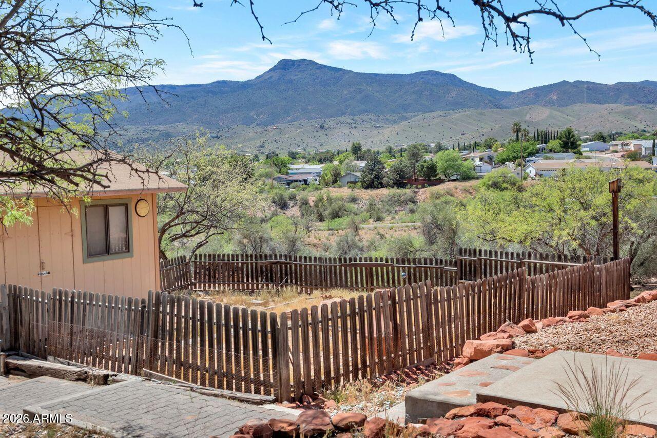 949 Rabbit Run Clarkdale, AZ 86324 - Photo 25 of 46 a view of a wooden fence and a mountain view