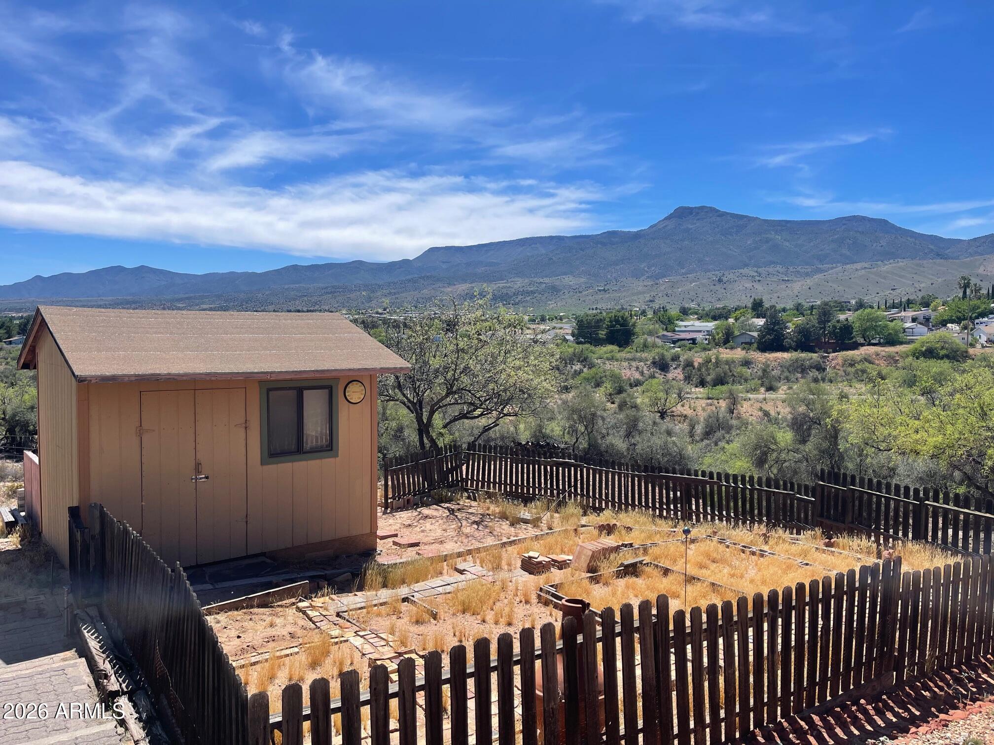 949 Rabbit Run Clarkdale, AZ 86324 - Photo 26 of 46 a front view of a house with a yard