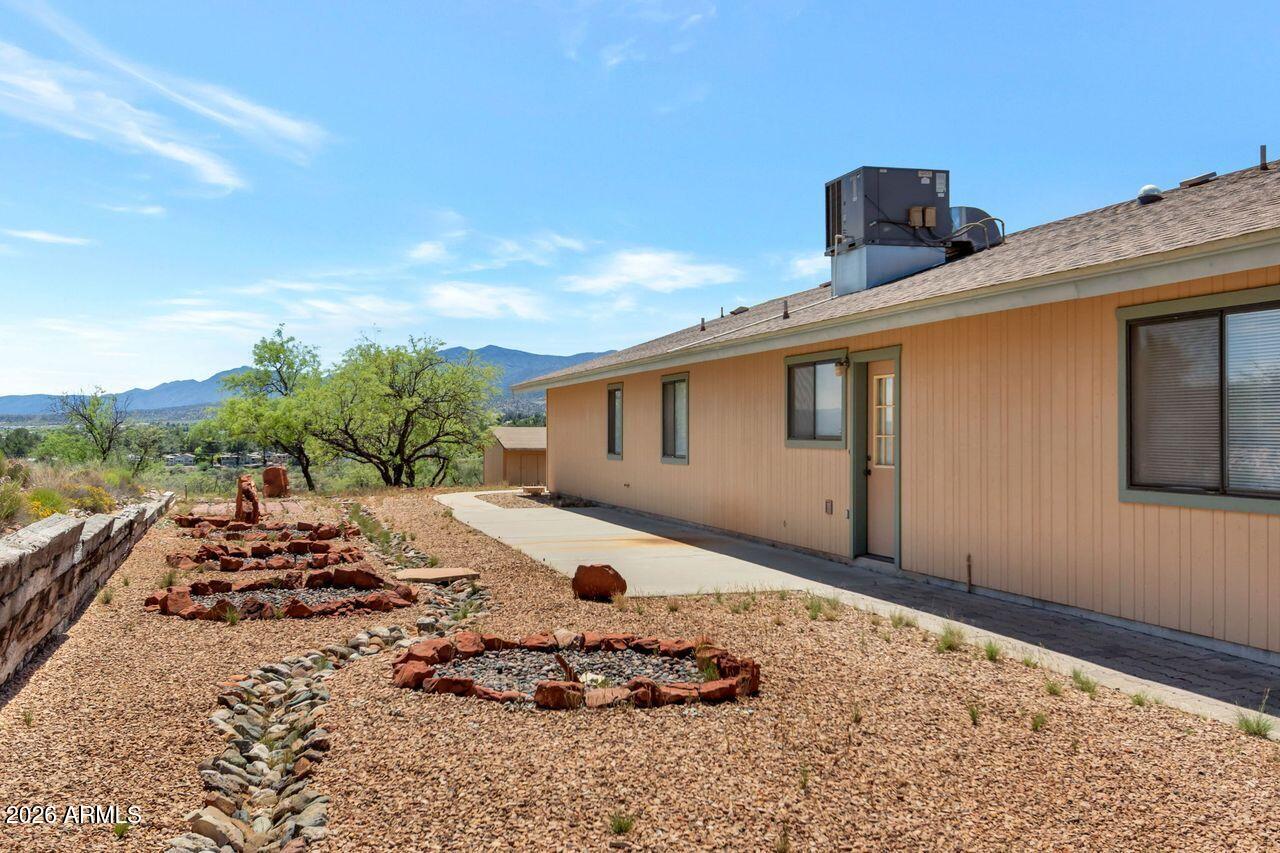 949 Rabbit Run Clarkdale, AZ 86324 - Photo 27 of 46 a front view of a house with a yard
