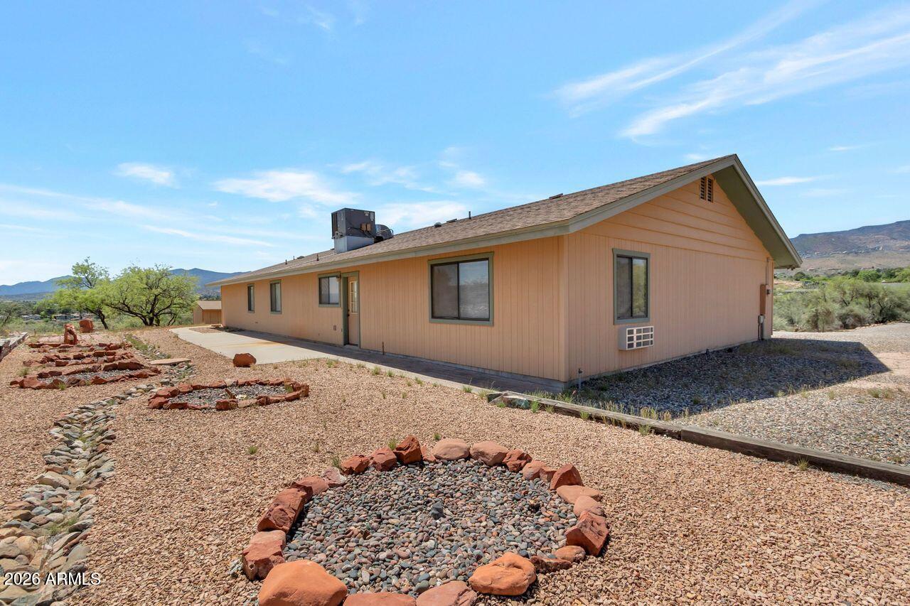949 Rabbit Run Clarkdale, AZ 86324 - Photo 29 of 46 a front view of a house with a yard
