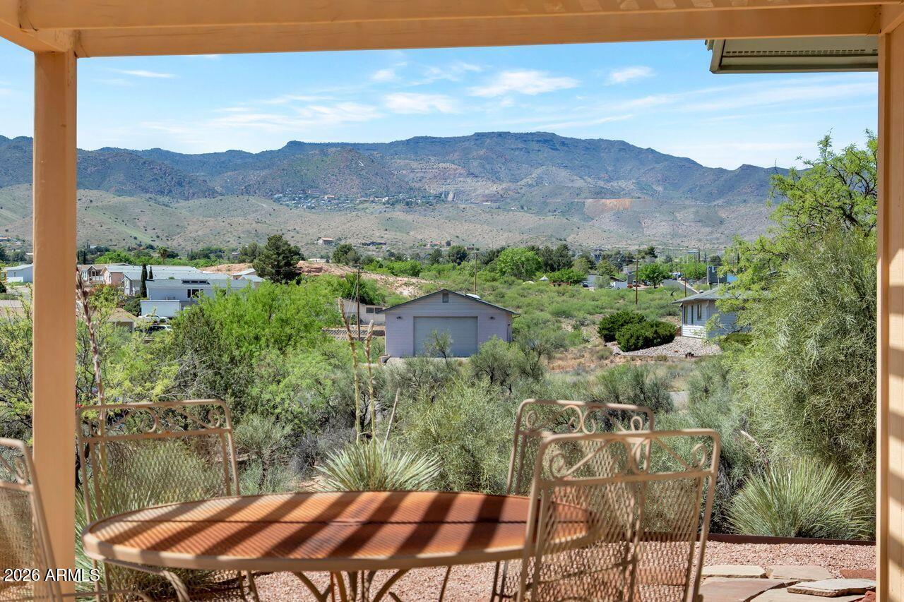949 Rabbit Run Clarkdale, AZ 86324 - Photo 32 of 46 a view of a couches under an umbrella next to a yard