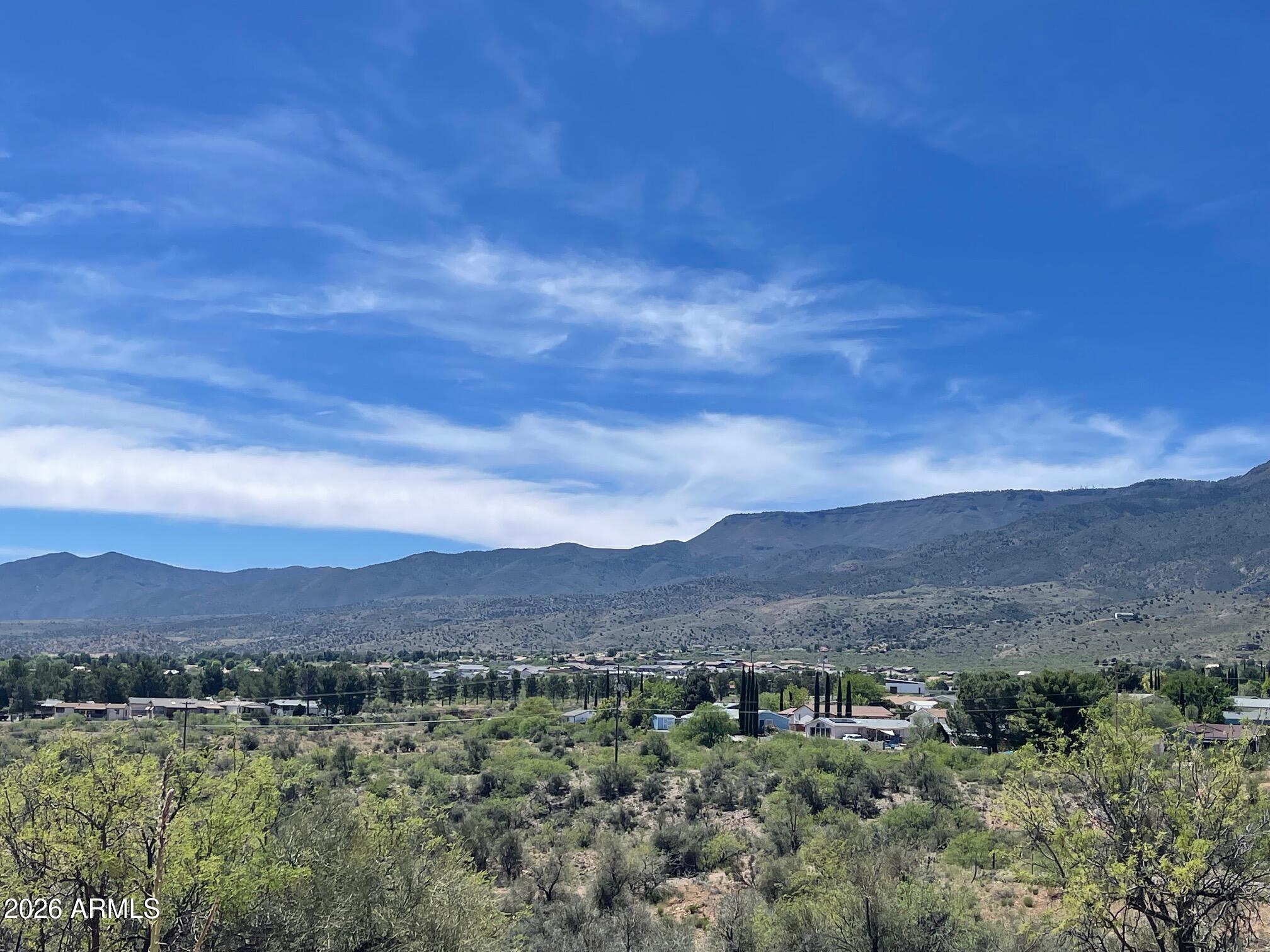 949 Rabbit Run Clarkdale, AZ 86324 - Photo 38 of 46 a view of a lush green hillside and a houses