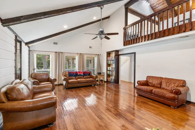 a kitchen with stainless steel appliances a stove a sink and a refrigerator