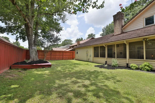 a view of a swimming pool with an outdoor seating