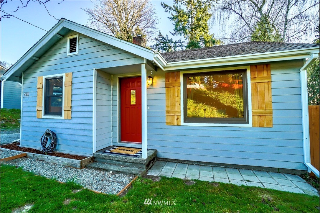 448 Windsor Way Northeast Renton, WA 98056 - Photo 1 of 20 a view of front of a house with a yard