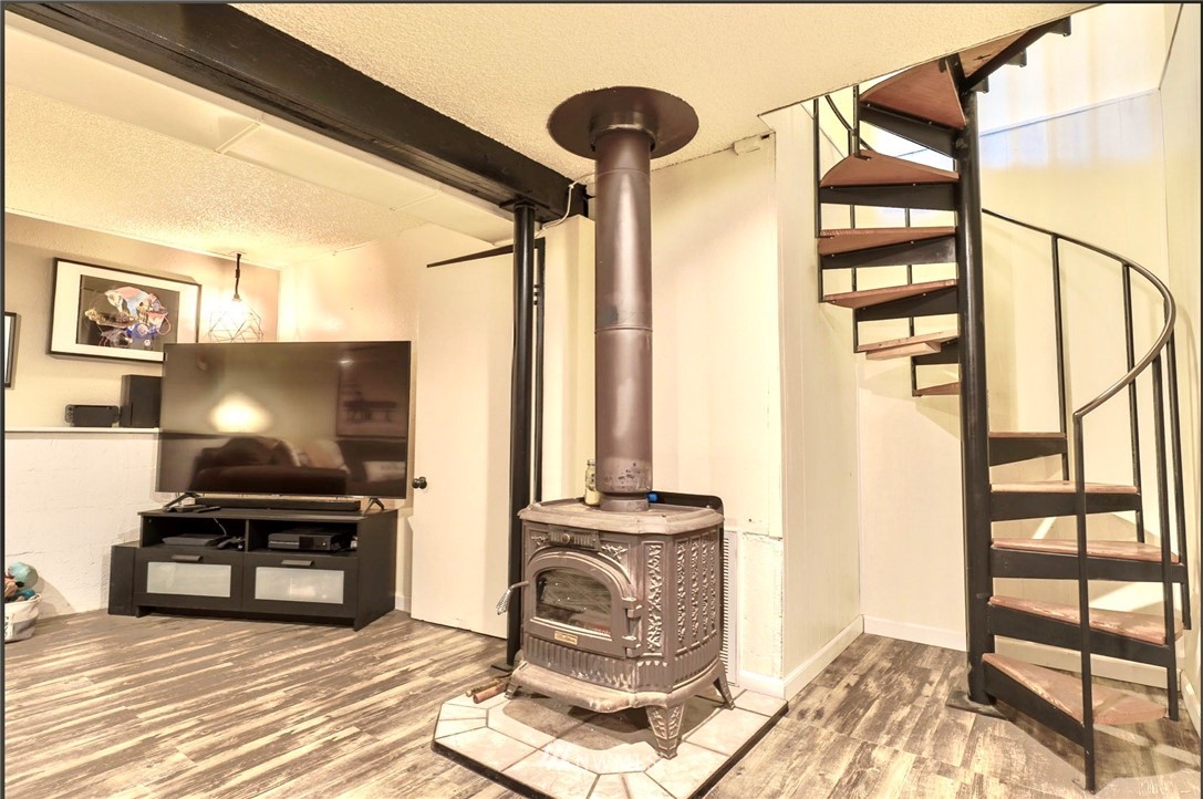 448 Windsor Way Northeast Renton, WA 98056 - Photo 12 of 20 a view of a livingroom with furniture and staircase
