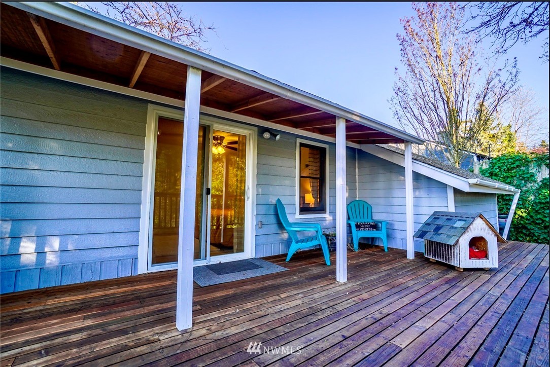 448 Windsor Way Northeast Renton, WA 98056 - Photo 16 of 20 a view of house with wooden floor and outdoor seating