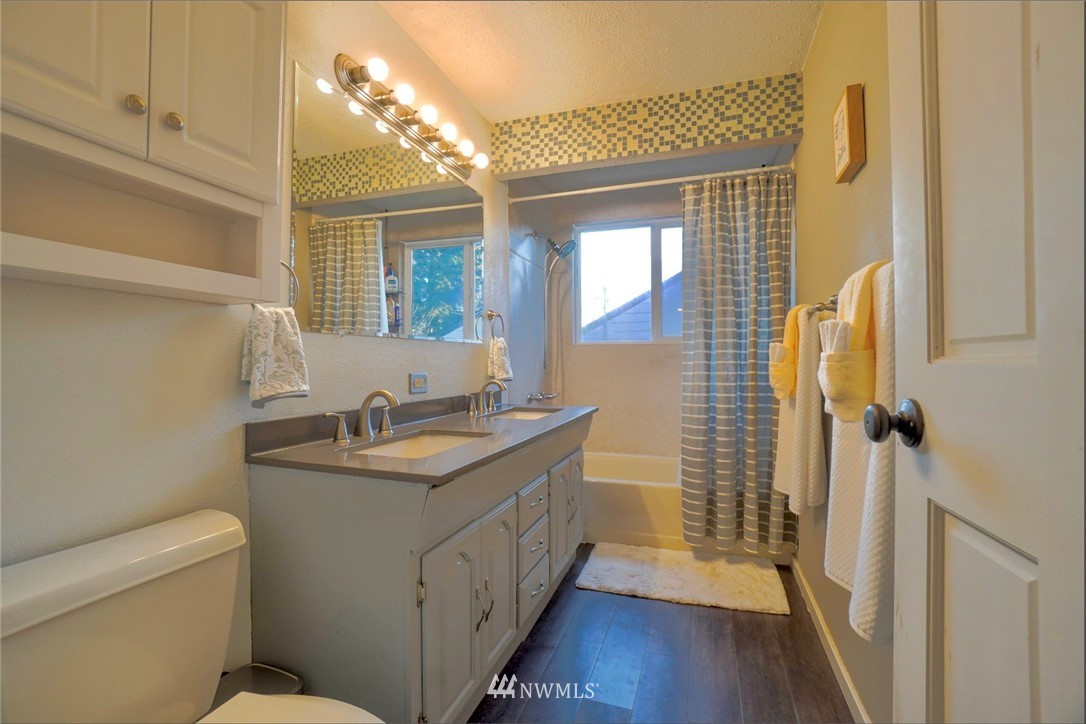 448 Windsor Way Northeast Renton, WA 98056 - Photo 8 of 20 a bathroom with sink and mirror