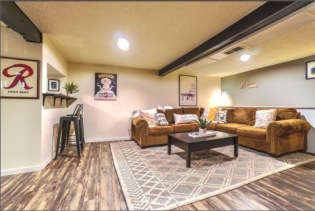 448 Windsor Way Northeast Renton, WA 98056 - Photo 10 of 20 a living room with furniture and a rug
