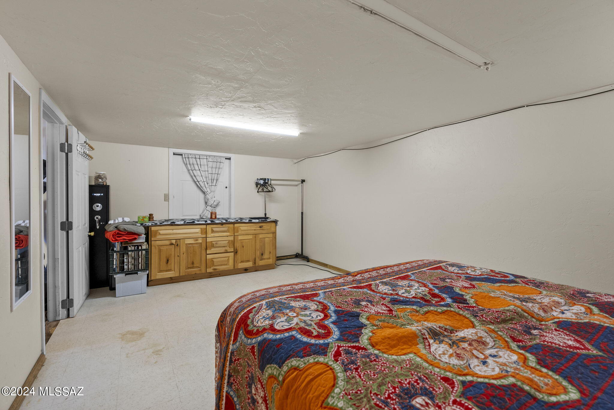 22 Vigas Lane Rio Rico, AZ 85648 - Photo 29 of 40 a bedroom with bed and window