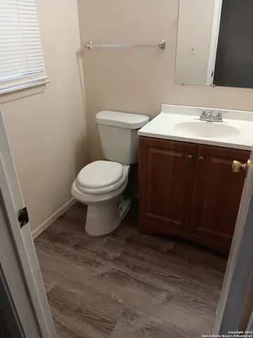 a bathroom with a sink and a toilet