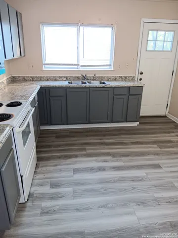 a view of a kitchen and a sink