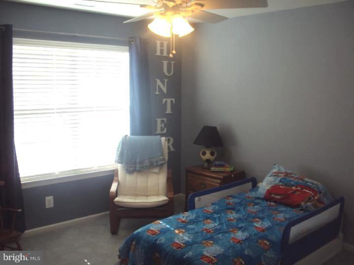706 Farmhouse Road Mickleton, NJ 08056 - Photo 15 of 24 a bedroom with a bed and a window