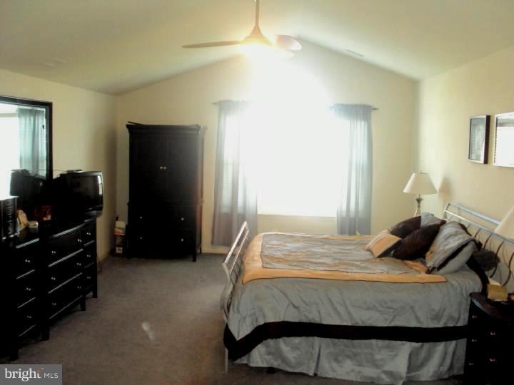 706 Farmhouse Road Mickleton, NJ 08056 - Photo 18 of 24 a bedroom with a bed and a closet