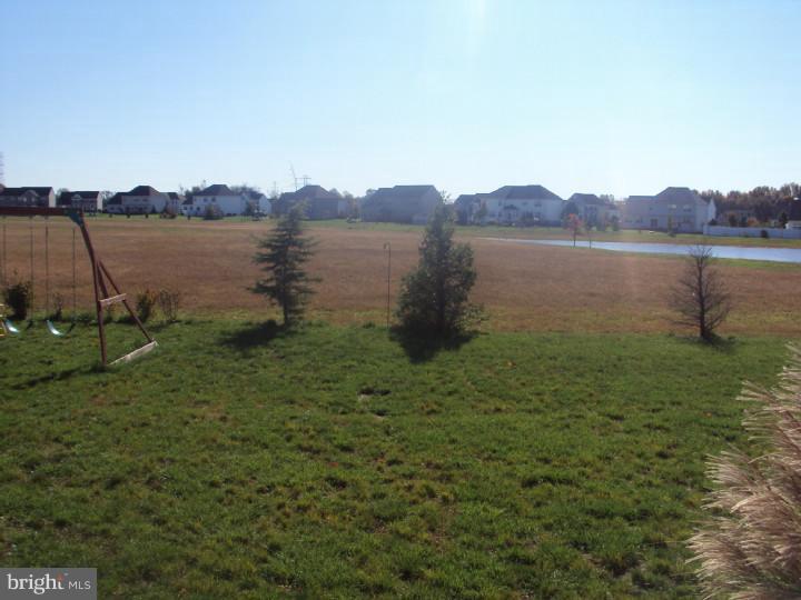 706 Farmhouse Road Mickleton, NJ 08056 - Photo 23 of 24 a view of a lake with a big yard