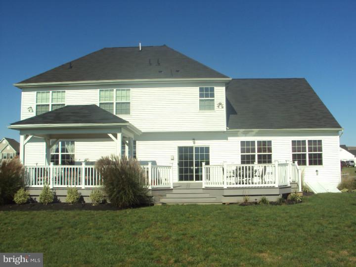 706 Farmhouse Road Mickleton, NJ 08056 - Photo 24 of 24 a front view of a house with a yard