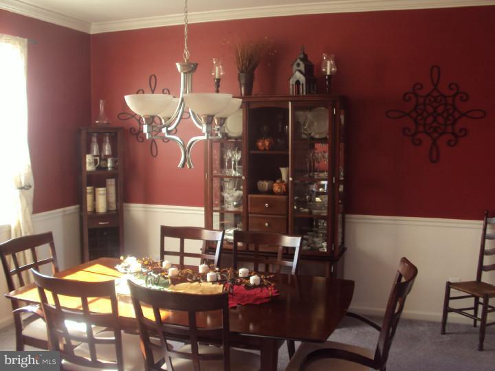706 Farmhouse Road Mickleton, NJ 08056 - Photo 5 of 24 a view of a dining room with furniture