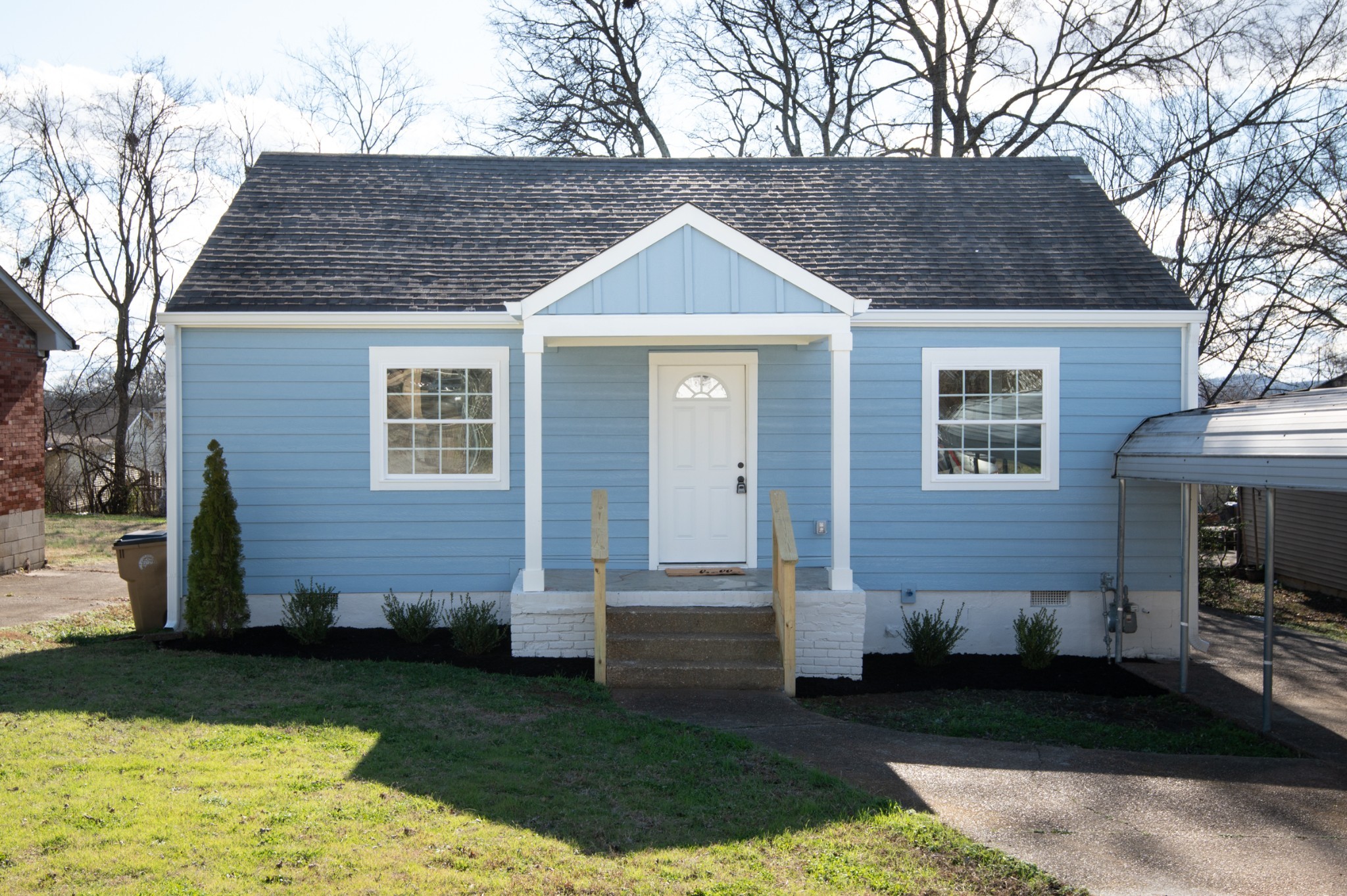 112 Wiley Street Madison, TN 37115 - Photo 1 of 36 a front view of a house with garden