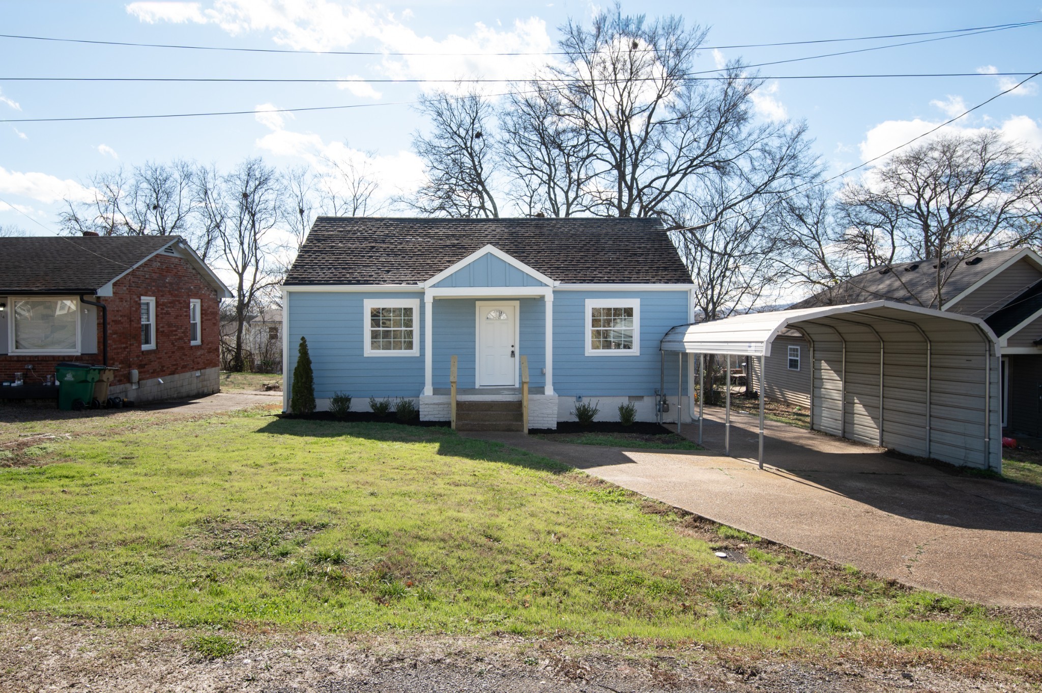 112 Wiley Street Madison, TN 37115 - Photo 2 of 36 a front view of a house with yard patio and fire pit