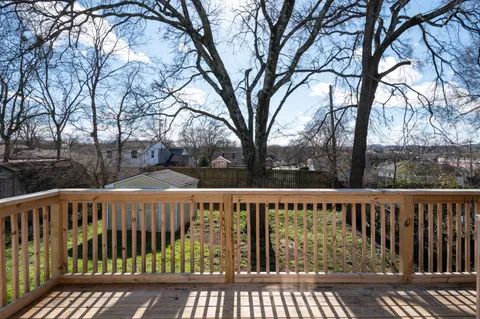 a view of a wooden roof deck