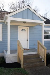 a front view of house with yard