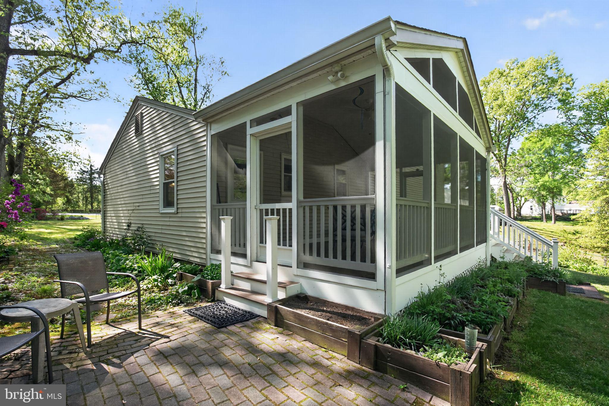 14004 South Springfield Road Brandywine, MD 20613 - Photo 21 of 54 stairs down to paver patio