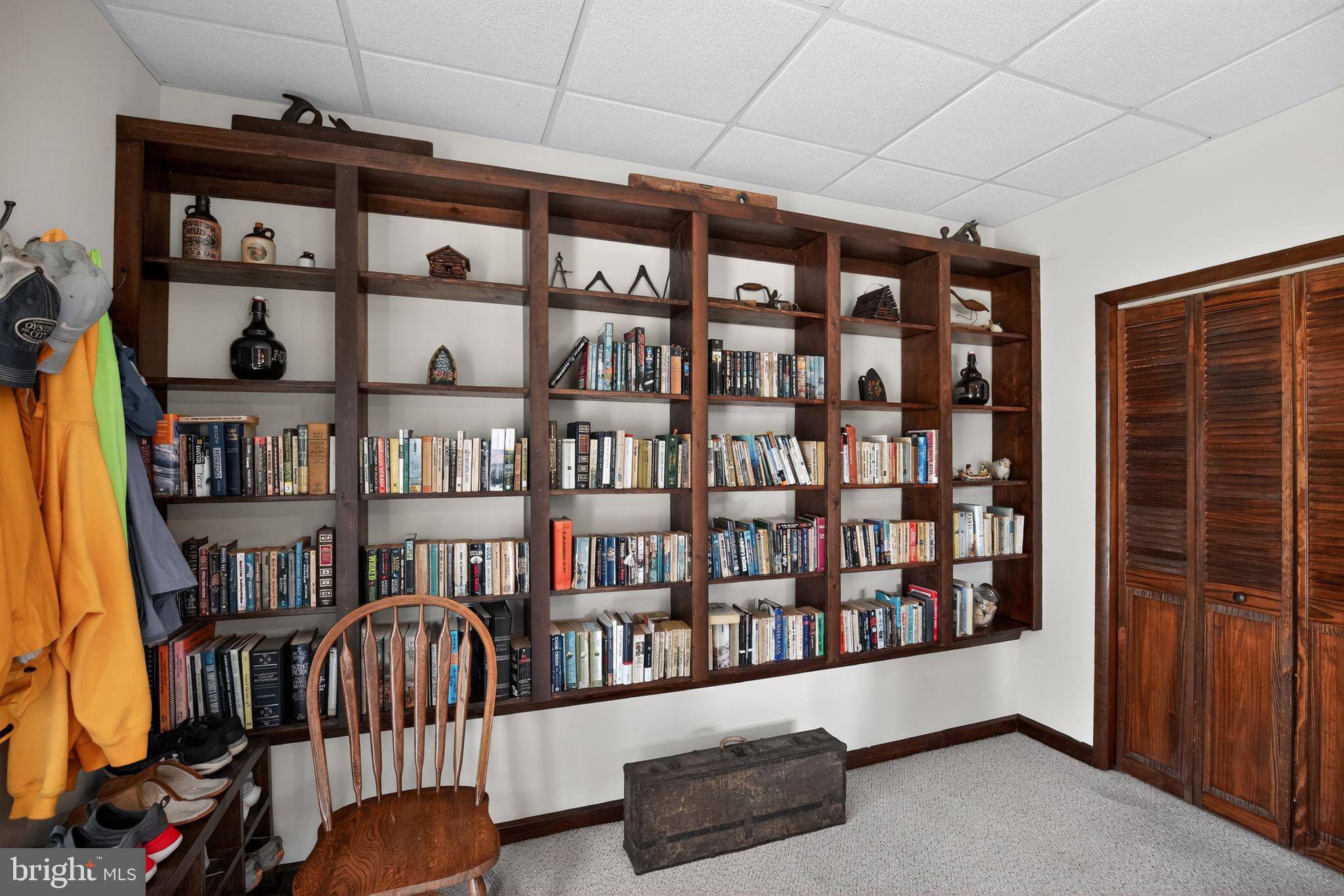 14004 South Springfield Road Brandywine, MD 20613 - Photo 28 of 54 built in bookshelves in basement