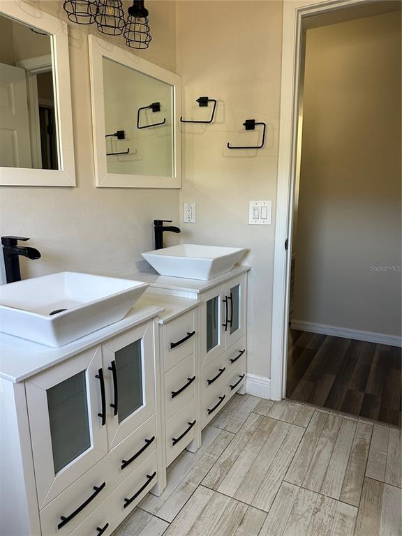 4150 Vanern Way Kissimmee, FL 34746 - Photo 25 of 51 a kitchen with stainless steel appliances a stove and a refrigerator