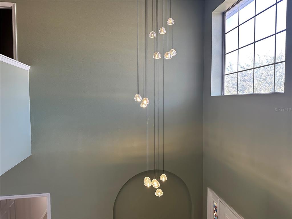 4150 Vanern Way Kissimmee, FL 34746 - Photo 38 of 51 an empty room with windows and painted walls