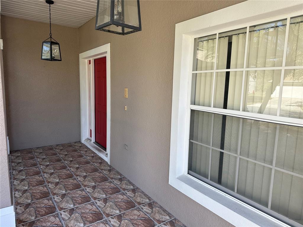 4150 Vanern Way Kissimmee, FL 34746 - Photo 44 of 51 a view of a closet area with wooden floor