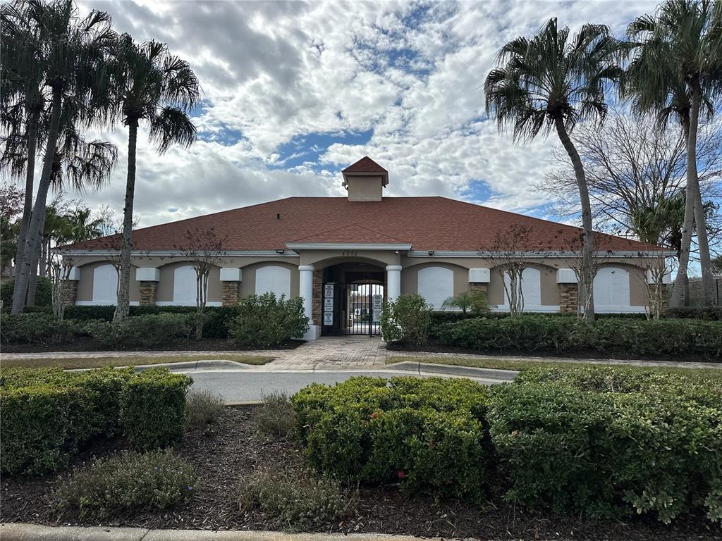 4150 Vanern Way Kissimmee, FL 34746 - Photo 46 of 51 a front view of a house with a garden
