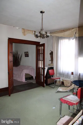 a room with furniture and window