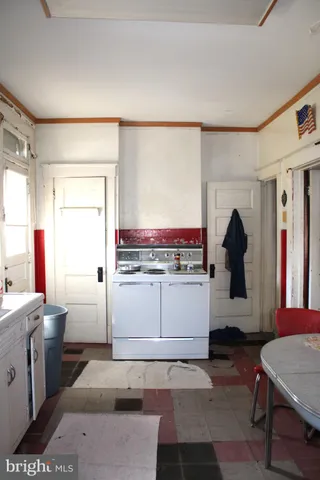 a room with cabinets and window