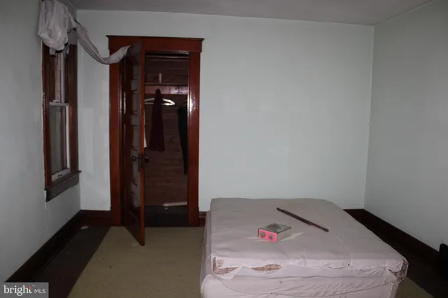 a view of a hallway view with staircase