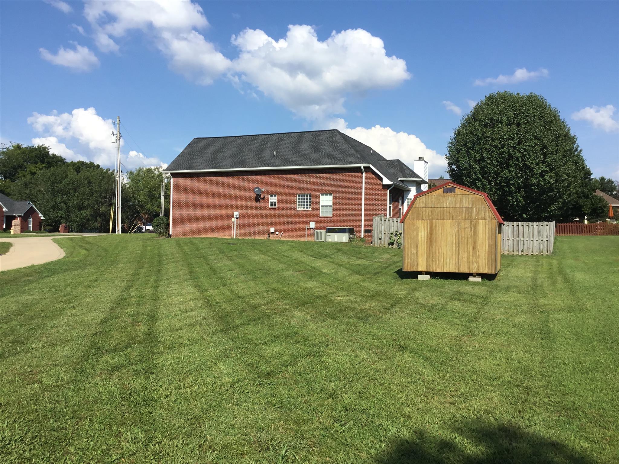 1013 Rhett Place Lebanon, TN 37087 - Photo 21 of 23 Yard extends beyond the privacy fence. Storage shed included!